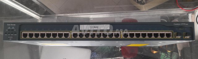 cisco catalyst 2950 10/100/1000 24 port  2x fibre