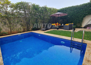 Villa en bande dans résidence fermée