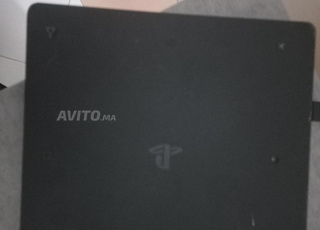 ps4 slim 1tb en ligne avec 2 manettes et fc25