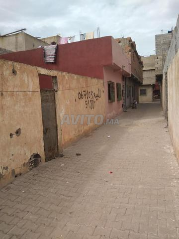 Lot 60m en face à 40 hay sina3i