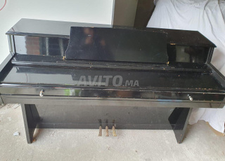 Piano Droit Wurlitzer d'occasion en vente 