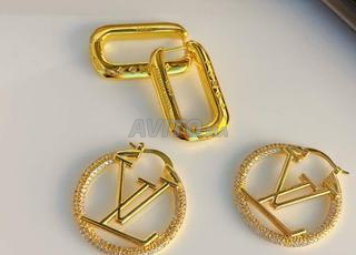 Boucles Louis Vuitton En Acier Inoxydable LV6500
