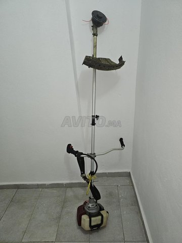 DEBROUSSAILLEUSE THERMIQUE 1400W CROWN