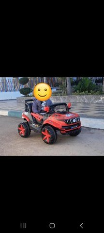 Voiture electrique enfant neuf deux batteries 
