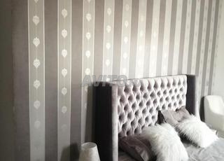 tête de lit capitonnée en velours gris