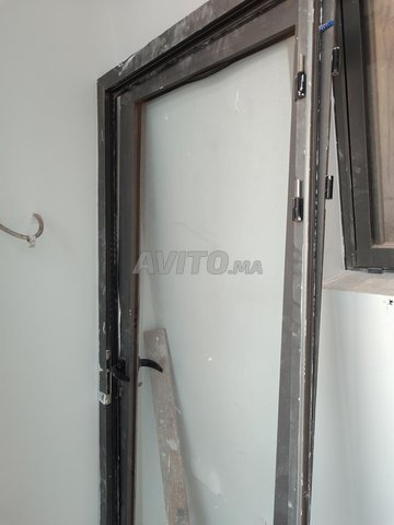 Porte aluminium et garde vitre 