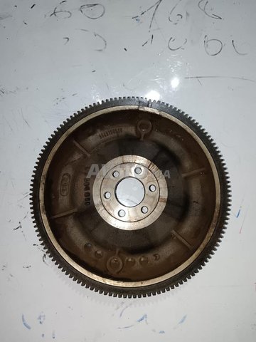 volant moteur et Groupe moteur et pombe