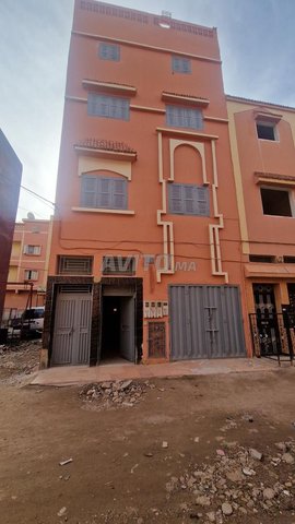 منزل بواجهتين  للبيع  بأربع طوابق و محل تجاري 