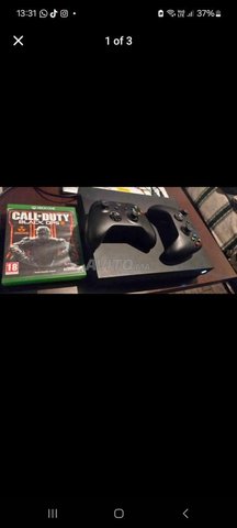 Xbox One X 1To en excellent état avec accessoires