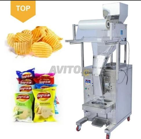 Machine automatique de pesage et d'emballage