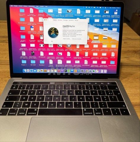 MACBOOLK PRO 15 avec Touch Bar Core i7 16 Go 512