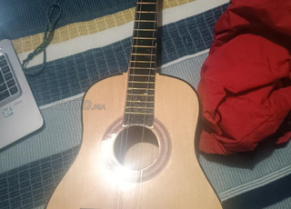 guitare avec corde cassée