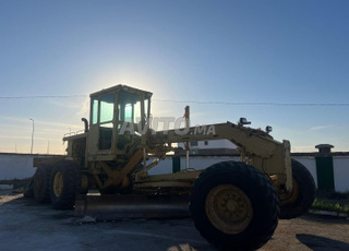 Niveleuse 12G caterpillar,JCB