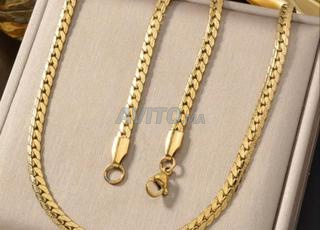 طقم رادكو قطعتين من سنسلة عنق و كورميط بديل ذهب م