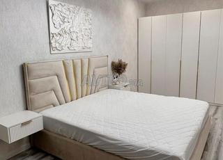 tête de lit capitonnée beige 2025