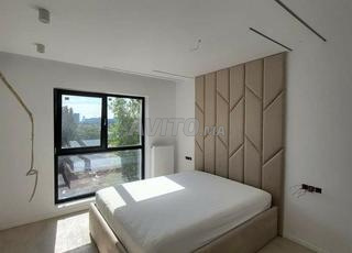 tête de lit capitonnée beige