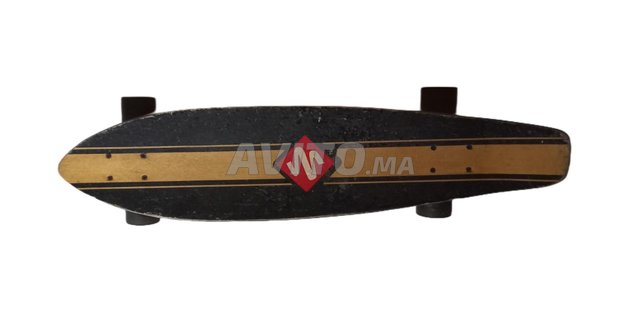 Skateboard Longboard Tres bon etat (Négociable)