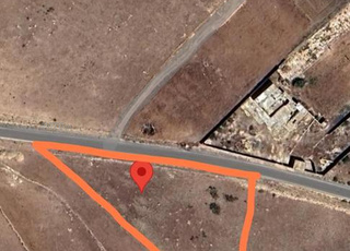 ارض محفظة 2600 متر على الكودرون