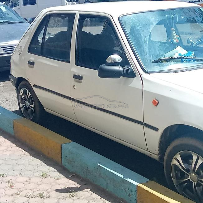 205 essence modèle 2000 moteur junior 