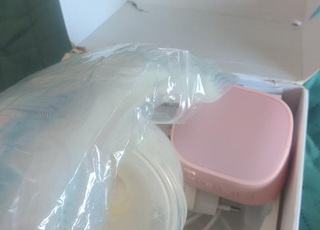 Tire lait main libre 