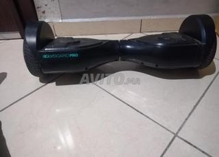  خدامة مزيان مع الشارجور hoverboard