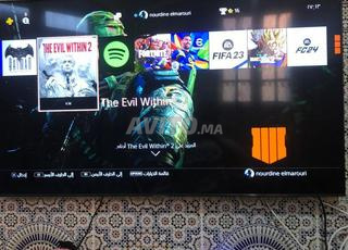 ps4 online 1tb m3ah manette ou les cables jdid