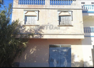 Un garage commercial et maison à vendre