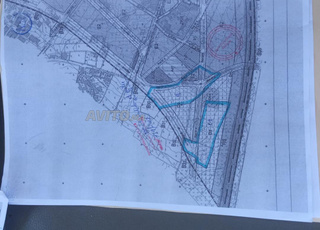 أرض محفظة بالمدار الحضري للبيع على الشياع 