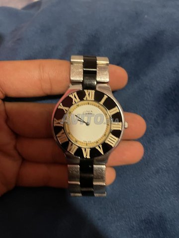 Montre Cartier authentique.