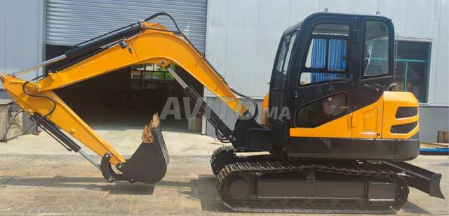 Mini-pelle P65 – 6780 kg avec 1 an de garantie
