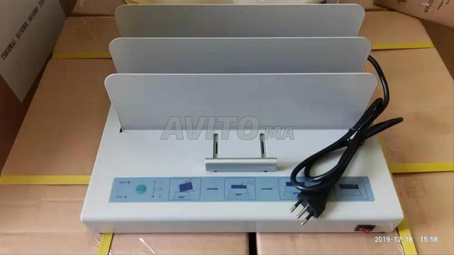 Machine de reliure thermique automatique