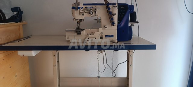 Machine à coudre colleteuse آلة الخياطة 