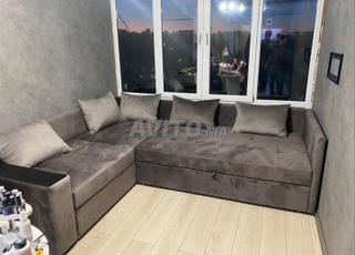 canapé en forme de L gris