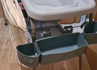 Ensemble baignoire table à langer