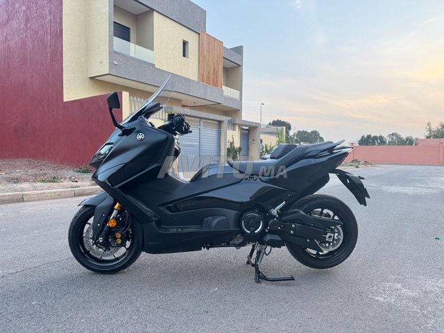 t max 560