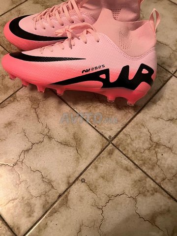 crampons nike rose 