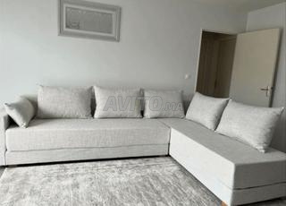 canapé d'angle gris clair