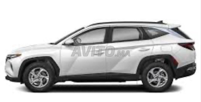 Voiture Elegante Tucson blanche