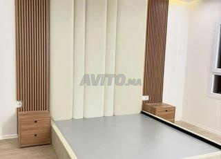 tête de lit en tissu beige clair