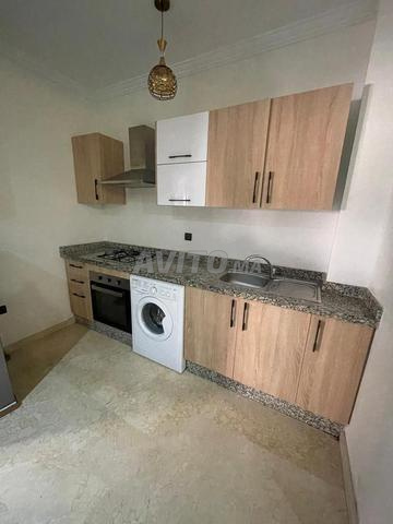 appartement propre acote la gar  - 2