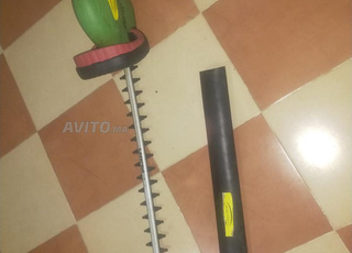 منشار كهربائي لقطع النباتات 