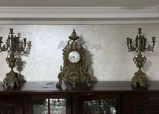 Horloge XIXᵉ en bronze et chandeliers 
