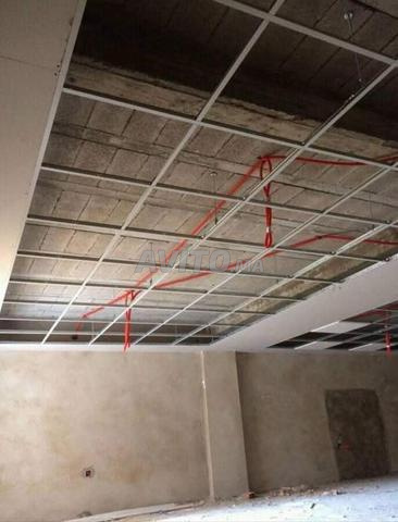 تقسيم وتغليف الجدران مع الاسقف المعلقه ba13 et 