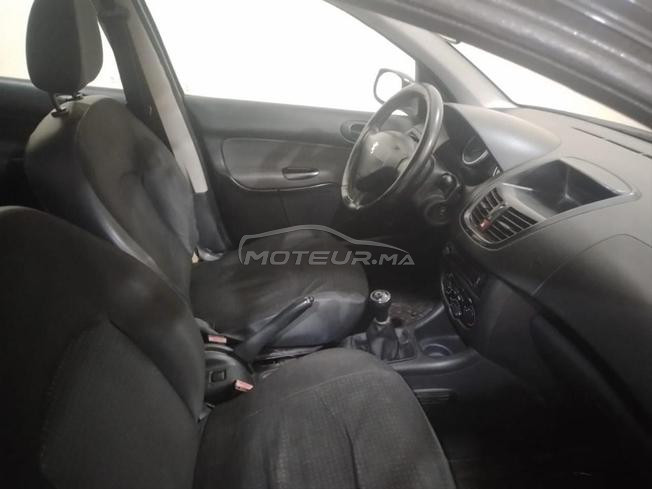 Peugeot  206  plus modèle 2013 jamais accident 