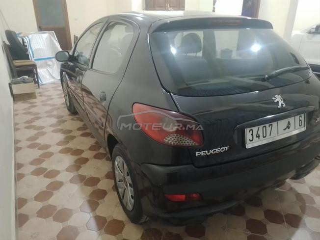 Peugeot  206  plus modèle 2013 jamais accident 