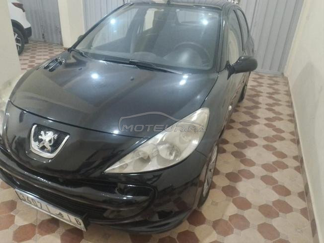 Peugeot  206  plus modèle 2013 jamais accident 