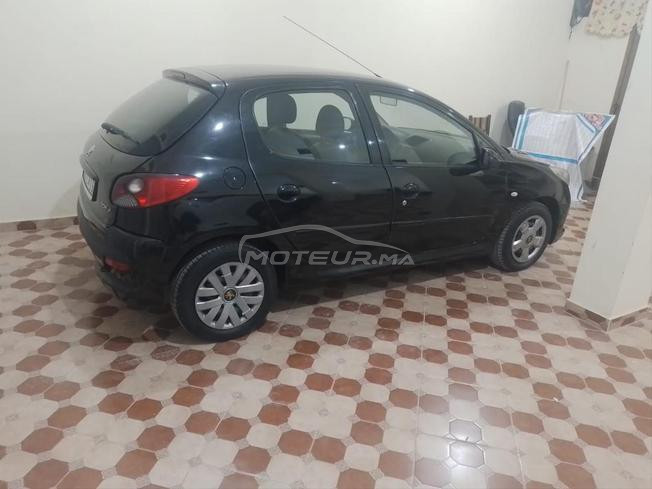 Peugeot  206  plus modèle 2013 jamais accident 
