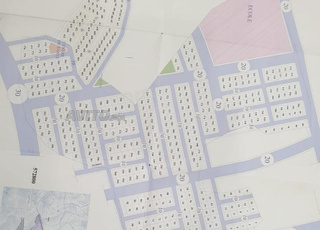 Terrain 2 façades lotissement ibtihal 7500 dh