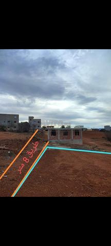 أرض محفضة للبيع بآيت قمرة 481متر   - 2