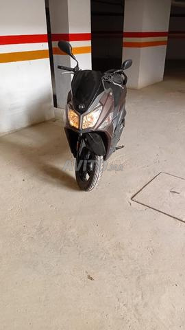MOTO  SYM TYPE XCA301 GENRE MOTO CYCLE ASSENCE